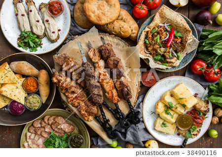 Outdoors Food Concept. Appetizing barbecued steak 38490116