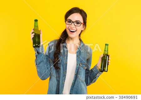 Young woman with two bottles 38490691