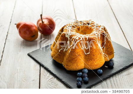 Bundt cake wih topping. Bundt cake wih topping. 38490705