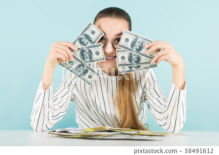 Attractive woman with cash 38491612