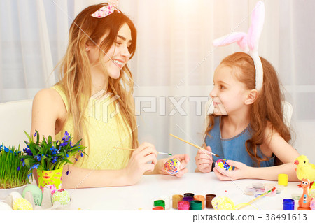 Happy family preparing for Easter. Happy family preparing for Easter. 38491613