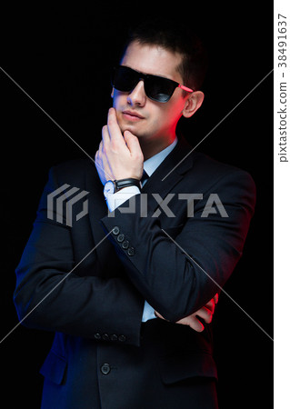 Portrait of confident handsome stylish businessman 38491637