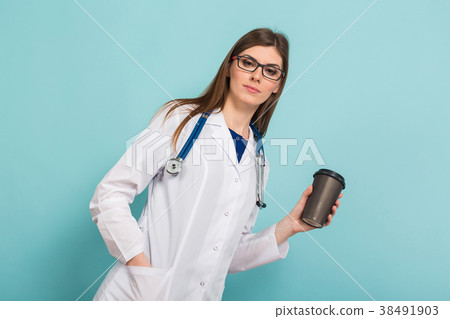Female doctor in glasses with coffee cup 38491903