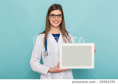 Female brunette doctor in glasses with frame Female brunette doctor in glasses with frame 38492295