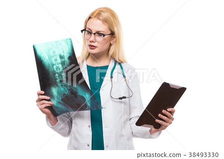 Woman doctor with X-ray and tablet 38493330