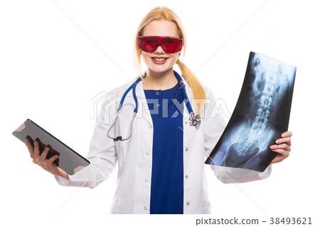 Woman doctor with X-ray and tablet 38493621