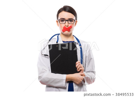 Young woman doctor with stethoscope holding Young woman doctor with stethoscope holding 38495533