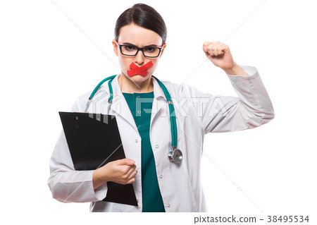 Young woman doctor with stethoscope holding Young woman doctor with stethoscope holding 38495534