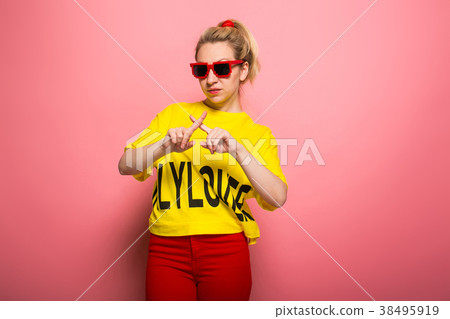 Blonde woman in bright clothes 38495919