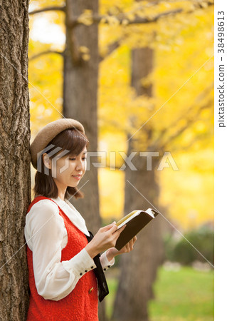 Autumn leaves and women Autumn leaves and women 38498613