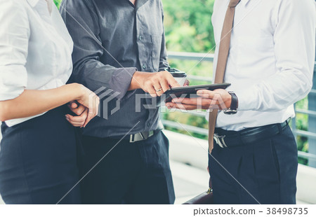 Group of Business people talking working Group of Business people talking working 38498735