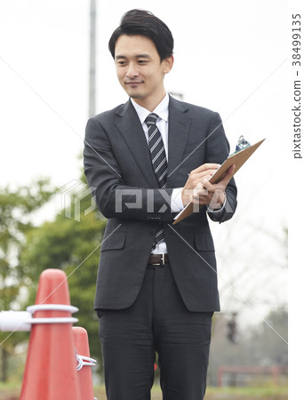 Instructor at a driving school Instructor at a driving school 38499135