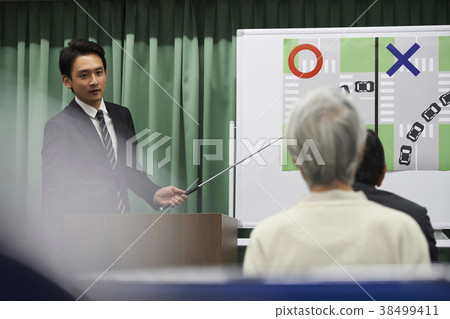 Senior taking a lecture 38499411