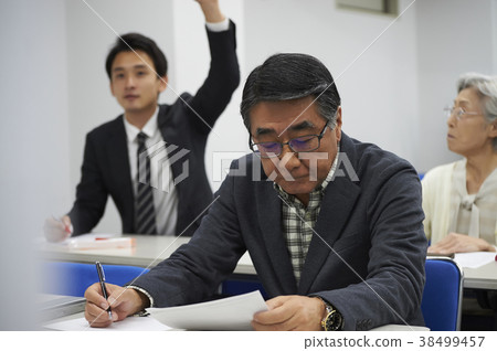 Senior taking a lecture 38499457