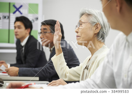 Senior taking a lecture 38499583