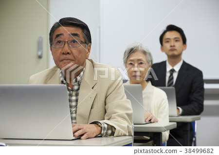 Senior taking a lecture 38499682