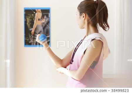 Woman doing fitness at home 38499823