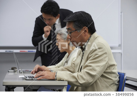 Senior taking a lecture 38499856