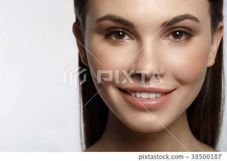 Joyful girl with beautiful smile Joyful girl with beautiful smile 38500187