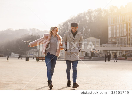 Cheerful romantic girlfriend and boyfriend are Cheerful romantic girlfriend and boyfriend are 38501749