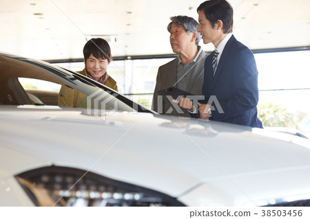 Car dealer senior couple Car dealer senior couple 38503456