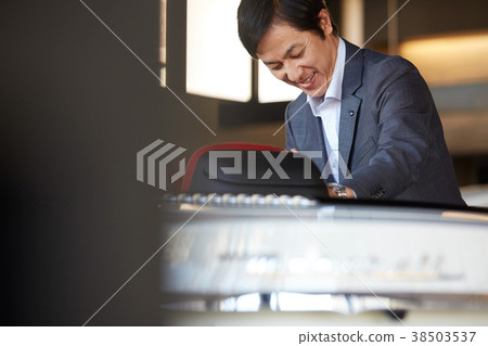 Car dealer executive executive luxury car Car dealer executive executive luxury car 38503537