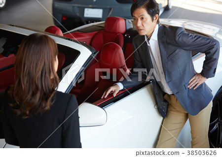 Car dealer executive executive luxury car 38503626