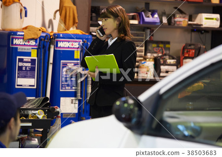 Car maintenance work smartphone staff 38503683