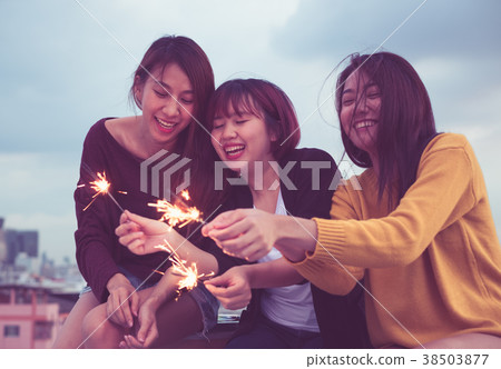 group of asia girl friends enjoy and play sparkler group of asia girl friends enjoy and play sparkler 38503877