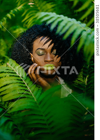 Sensitive outdoor portrait of the attractive 38505681