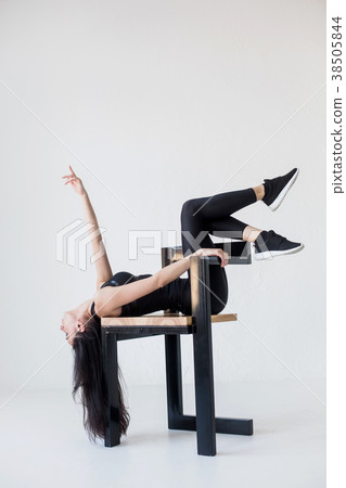 The sports attractive flexible woman in sportwear The sports attractive flexible woman in sportwear 38505844