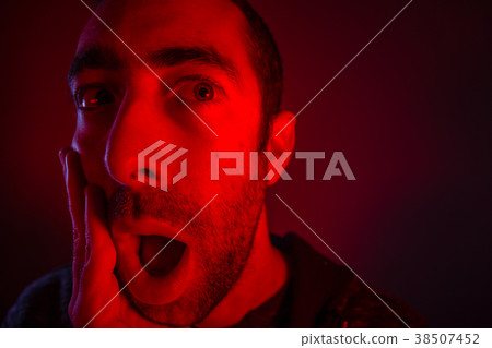 Man with surprised facial expression Man with surprised facial expression 38507452