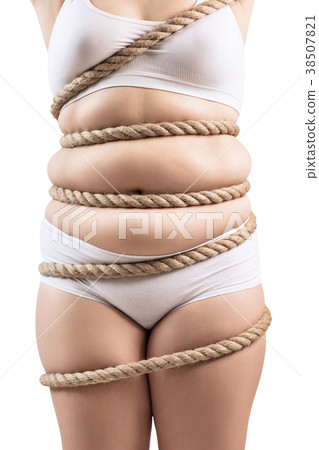 Fat woman in white underwear twisted with a rope. 38507821