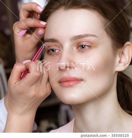 Permanent microblasting tattooing freckles to a Permanent microblasting tattooing freckles to a 38508520