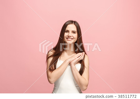 The happy business woman standing and smiling The happy business woman standing and smiling 38511772