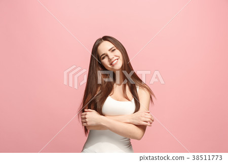 The happy business woman standing and smiling The happy business woman standing and smiling 38511773