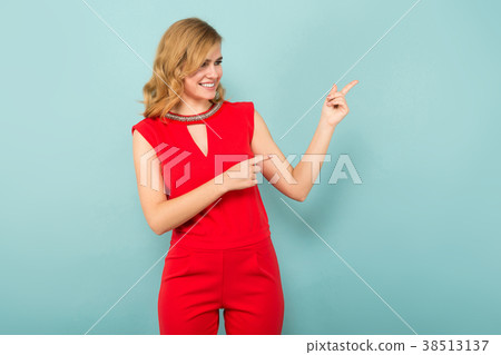 Attractive blonde woman in red overalls Attractive blonde woman in red overalls 38513137