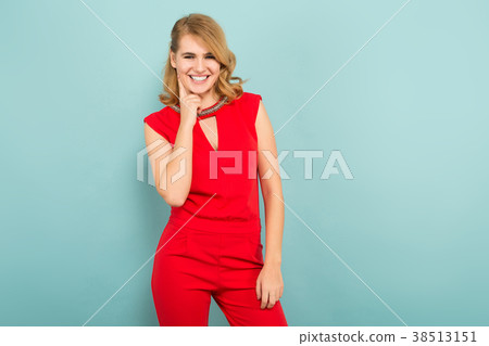 Happy woman in red overalls Happy woman in red overalls 38513151