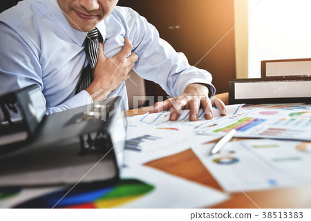 Businessman having heart attack. Businessman having heart attack. 38513383