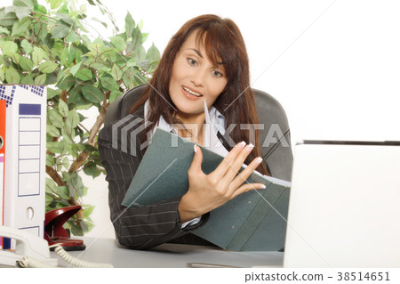 Young woman is shocked by what she sees in the document Young woman is shocked by what she sees in the document 38514651