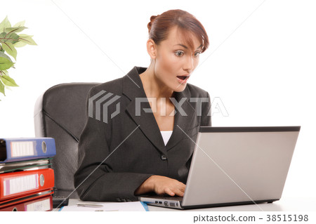 Woman is shocked by what she sees on the monitor Woman is shocked by what she sees on the monitor 38515198