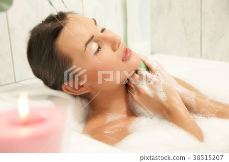 Beautiful women relaxing in her bath Beautiful women relaxing in her bath 38515207