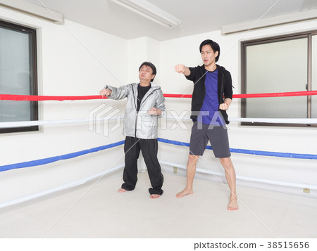 Gym trainer and men Gym trainer and men 38515656