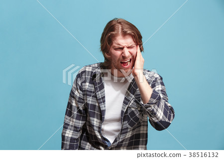 The Ear ache. The sad man with headache or pain on 38516132