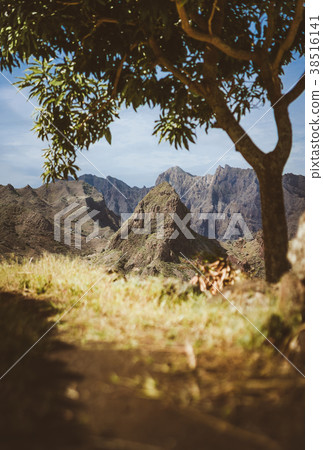 Amazing huge barren mountain range appearing on 38516141