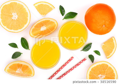 orange juice glass with slices of citrus and green 38516590