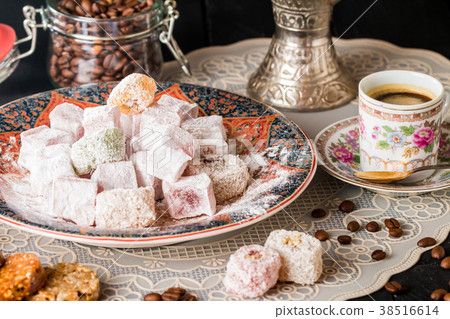 Cup of coffee with turkish delight  38516614