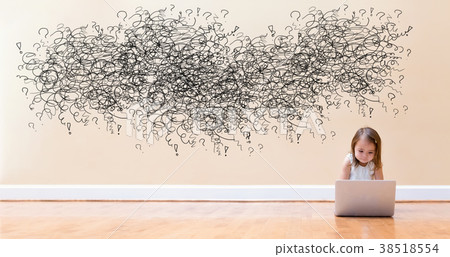 Doodles with little girl using a laptop computer  38518554