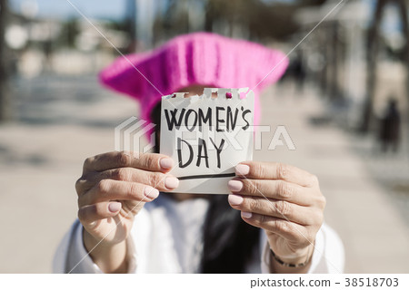 woman with a pink hat and the text womens day woman with a pink hat and the text womens day 38518703