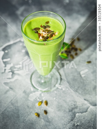 Healthy green smoothie with spinach, banana, mango Healthy green smoothie with spinach, banana, mango 38519304